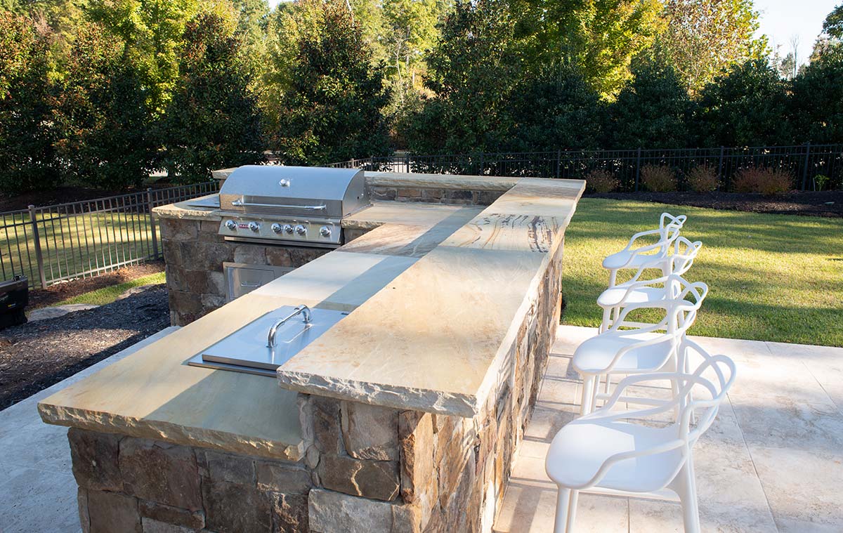 Outdoor Kitchen with Grill and seating